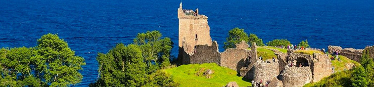 Urquhart Castle along Loch Ness lake in Scotland